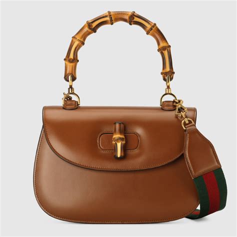 gucci handbag bamboo handles|Gucci Bamboo 1947 Ultimate Review: Sizes, Prices, What Fits.